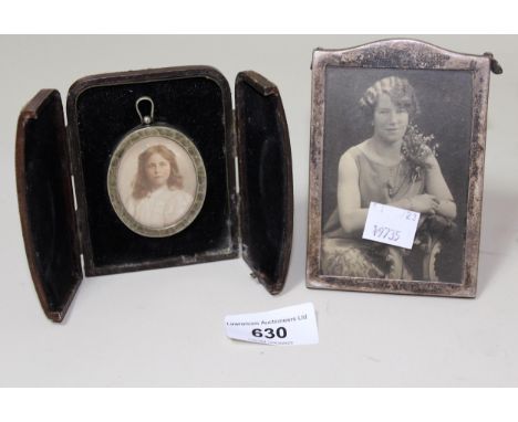 Small Birmingham silver photograph frame, 11cms high, together with a metal mounted portrait miniature in original leather ca