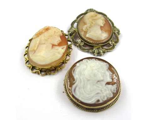 Two 9ct Gold mounted portrait cameo brooches, together with a silver gilt mounted cameo portrait brooch 