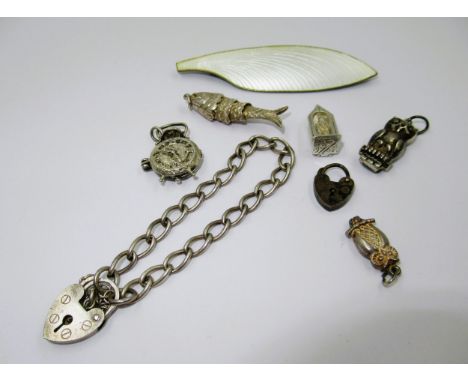 Danish sterling silver enamel decorated feather brooch, makers mark VB together with a silver bracelet and various charms 