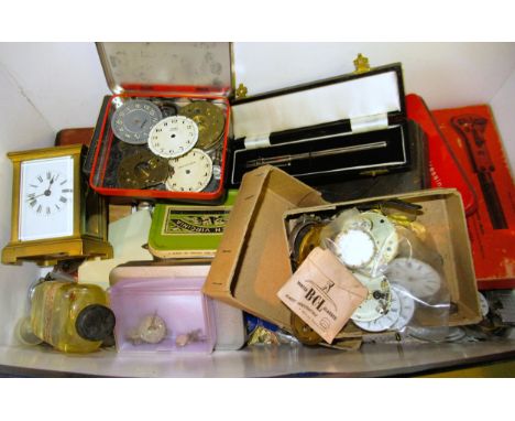 Box containing a large quantity of various pocket watch parts and tools, also including a carriage clock 