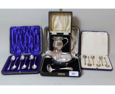 Cased silver sauce boat with ladle, cased Chester silver Christening mug and two cased sets of silver spoons 