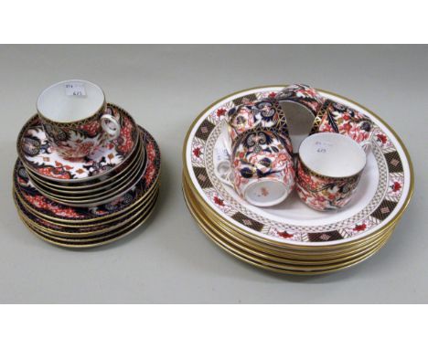 Six Royal Crown Derby, ' Derby Border ' dinner plates, together with a Derby Imari pattern six place setting tea service 