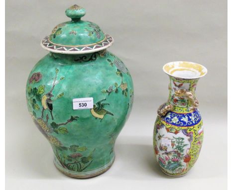 Large 19th Century Chinese famille verte temple jar and cover, decorated with flowers and birds on a green ground, 38cms high