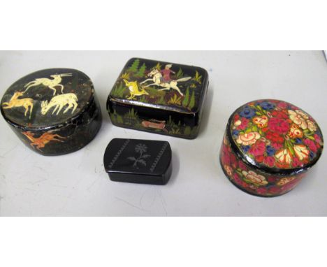 Three small Kashmiri boxes and a 19th Century papier mache snuff box 