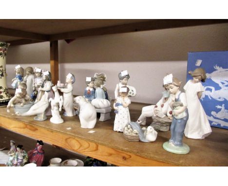 Small collection of Nao, Lladro and Royal Copenhagen figures 