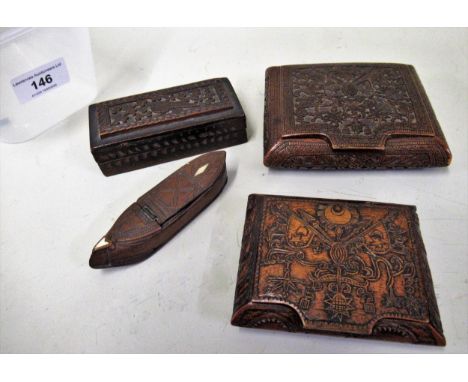 Two carved snuff boxes, possibly Napoleonic prisoner of war, together with another small carved rectangular box and a snuff b