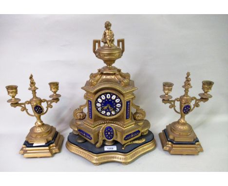 19th Century French gilded spelter mantel clock, the blue enamel dial with cartouche numerals, two train movement with outsid