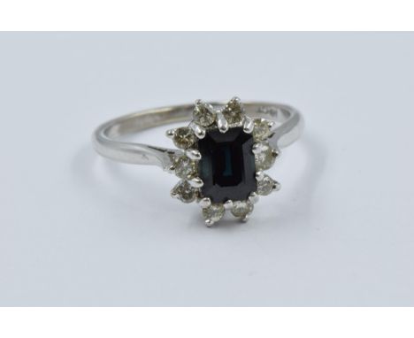 18ct White gold sapphire and diamond oval cluster ring, size 'R' 