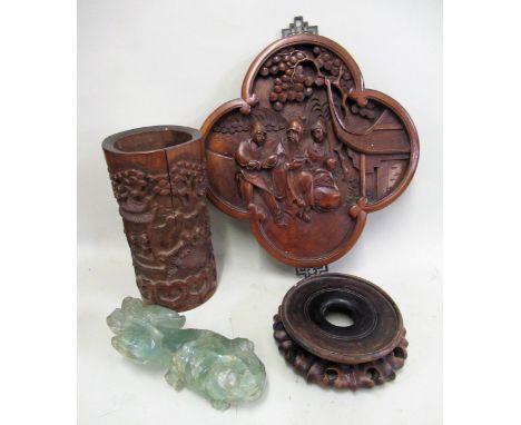 Chinese cylindrical carved bamboo vase, together with a carved wooden plaque, a vase stand and a hardstone figure of a fish 