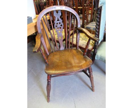Late 19th / early 20th Century wheelback Windsor elbow chair, together with a mahogany oval swing frame toilet mirror and a g