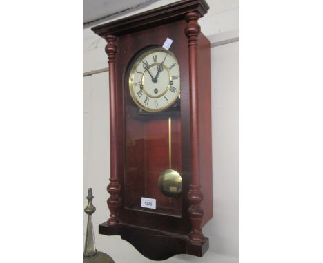 Small reproduction mahogany Vienna style three train wall clock 