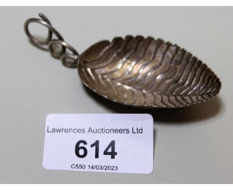 Small silver leaf form caddy spoon, with makers mark E.M.There has been a solder repair at the base of the handle, otherwise 