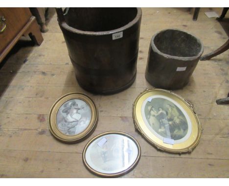 20th Century iron bound bucket with swing handle, a smaller bucket carved from the solid and three oval gilt framed prints 