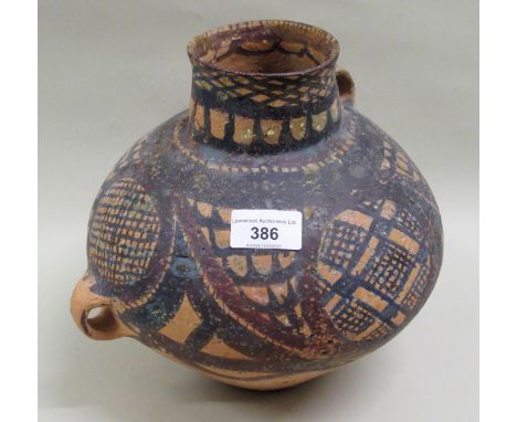 Chinese pigment painted pottery two handled jar, possibly Neolithic, 23cms high (various surface marks, rim chips and touchin