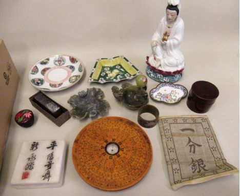 Box containing a collection of various oriental items including a compass bearing text, cloisonne napkin ring, green stone bo