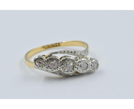 18ct Yellow gold five stone diamond crossover ring, 3.8g 