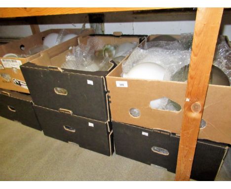 Six boxes containing a collection of Victorian and Edwardian glass oil lamp shades, reservoirs, flutes etc. 