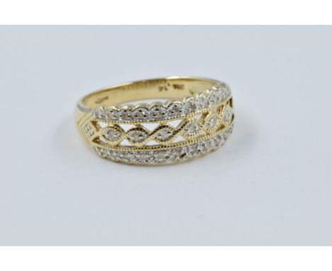 9ct Yellow gold diamond set dress ring of pierced design, size 'P', 3g 