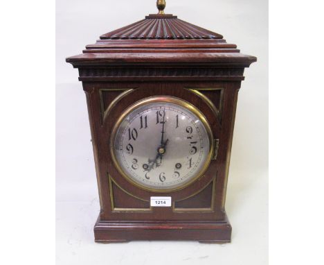 Early 20th Century mahogany and brass mounted bracket clock, the circular silvered dial with Arabic numerals and two train mo