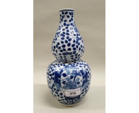 Chinese porcelain gourd shape vase, blue and white decorated with figures, flowers and birds, 26cms highIn good condition 