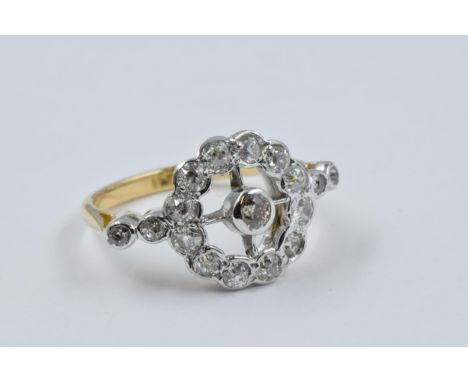 18ct Yellow gold diamond set ring of pierced design, size 'M', 4.1gIn excellent condition, no damage or repair. Stones have b