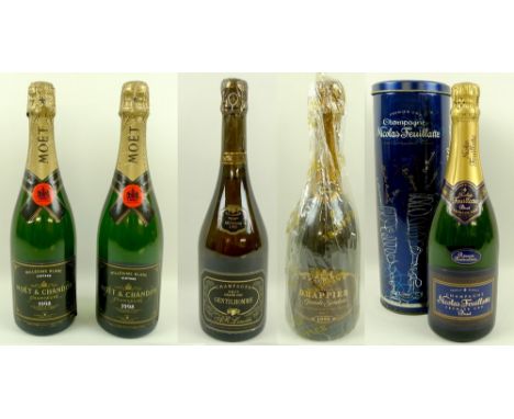 A group of five bottles of vintage champagne, comprising two bottles of Moet & Chandon Champagne, Millesime Blanc, Brut, Vint