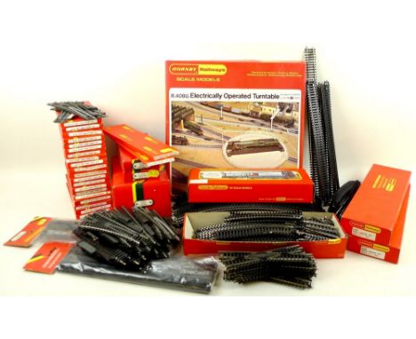 A group of Hornby track, including some boxed, R.408U Electrically Operated Turntable, points, R.400 Signal Control Set, R.66