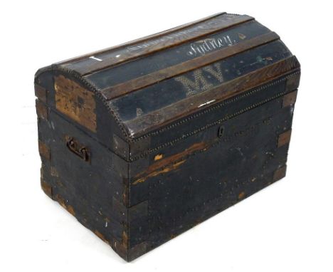 A Victorian stained pine trunk, with domed lift lid fitted with oak slats, studded initials 'M.V' and painted in white 'Minni