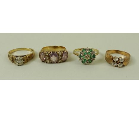 A group of four 9ct gold rings, comprising an illusion set diamond solitaire ring with hearts to the the shoulders, size Q, a