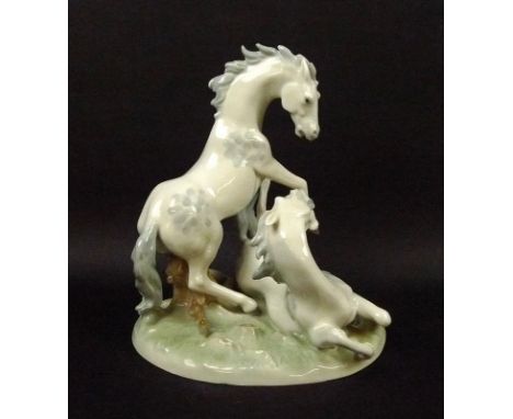 A Sitzendorf porcelain horse figural group of a dappled grey stallion and mare, model number 11963, with printed mark and imp