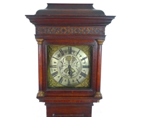 A George III oak longcase clock, with silvered brass face, signed Samuel Young, Nantwich, date roller aperture and floral eng