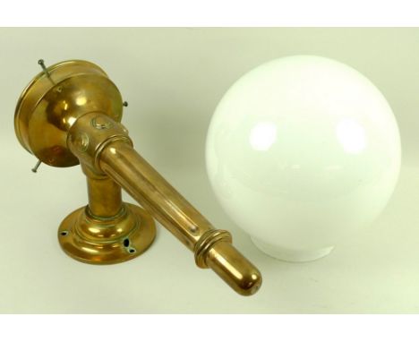 A late 19th / early 20th century brass wall light sconce, in Neoclassical style with fluted base and large white glass globe 