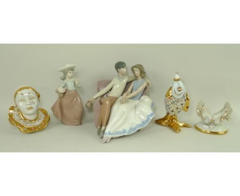 A Capodimonte figurine of a pierrot with Swarovski teardrop, 13cm, a Capodimonte figurine of a leaping fish, 15cm, a Limoges 