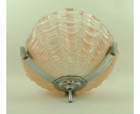 An Art Deco chrome and pink glass shell ceiling light, the shade formed in three sections held in a chromed metal frame, with