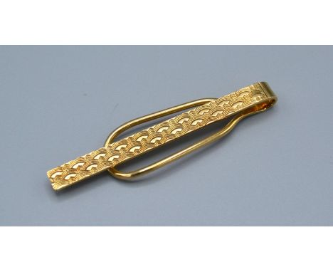 A 9ct Gold Tie Pin with engine turned decoration 4.9grams 
