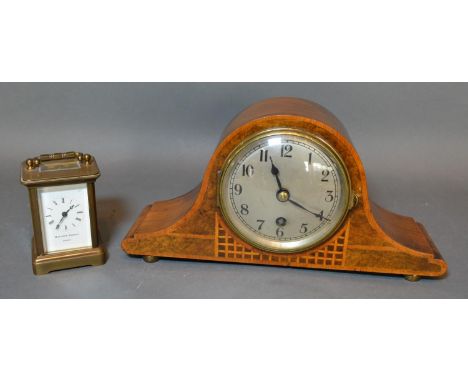 A Brass Cased Carriage Clock of Small Proportions by Matthew Norman London together with a walnut cased mantel clock 