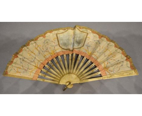 An 18th Century Ivory Fan, the silk leaf hand painted with a cartouche, the sticks and guards highlighted with gilt, 21cm lon