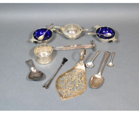 A Georgian Silver Tea Caddy Spoon together with a three piece silver condiment set and other small items of silver 