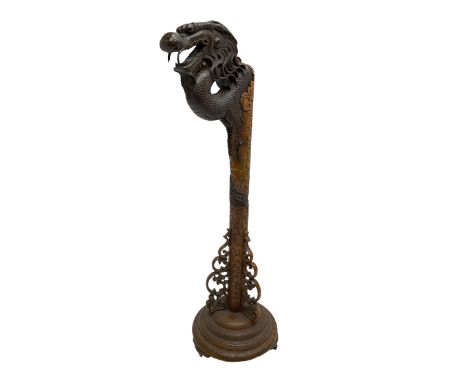 Mid to late 20th century carved hardwood lantern stand, carved with scaled dragon, on circular stepped base with carved decor
