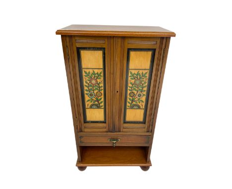 19th century and later walnut cabinet, enclosed by two doors with pained and carved floral decoration, fitted with drawer and