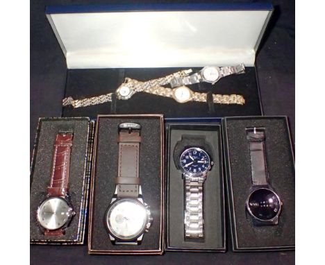 Four boxed gents wristwatches and three ladies examples. UK P&amp;P Group 1 (£16+VAT for the first lot and £2+VAT for subsequ