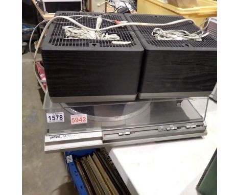 Garrard DQ-100 quartz and two Philips speakers. All electrical items in this lot have been PAT tested for safety and have pas