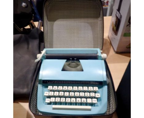 Petite Deluxe junior cased typewriter. Not available for in-house P&P 
