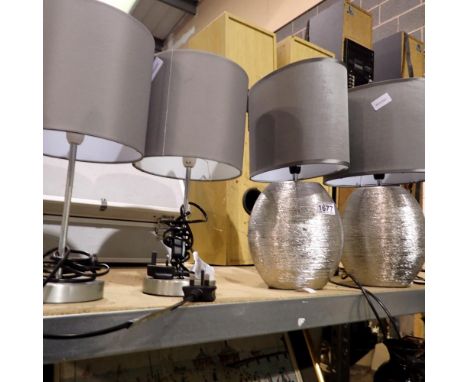 Two pairs of modern table lamps. All electrical items in this lot have been PAT tested for safety and have passed. This does 