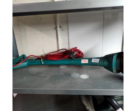 Bosch Art 23 easy trim edge trimmer, working. All electrical items in this lot have been PAT tested for safety and have passe