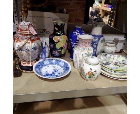 Shelf of Oriental ceramics. Not available for in-house P&amp;P 