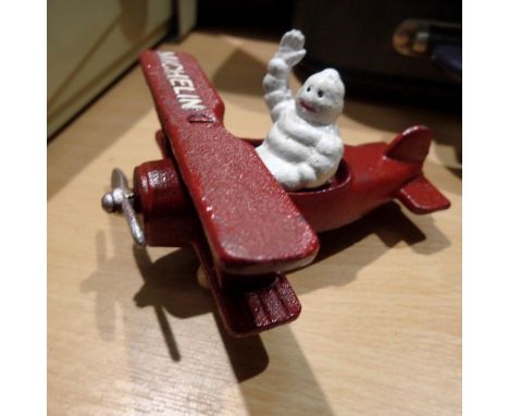 Cast iron Michelin Man in plane figure, L: 12 cm. UK P&amp;P Group 1 (£16+VAT for the first lot and £2+VAT for subsequent lot