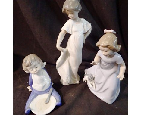 Three Nao figurines. Not available for in-house P&amp;P 