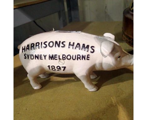 Cast iron Harrisons Hams Pig moneybox, L: 18 cm. UK P&amp;P Group 1 (£16+VAT for the first lot and £2+VAT for subsequent lots