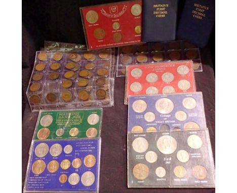 Eight cased coin sets with other collection sheets .UK P&amp;P Group 1 (£16+VAT for the first lot and £2+VAT for subsequent l
